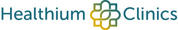 Logo of Healthium Clinics in Henley-On-Thames featuring the name in blue-green gradient text. To the right of Healthium is an abstract symbol composed of intertwined shapes forming a cross-like design with similar coloring.